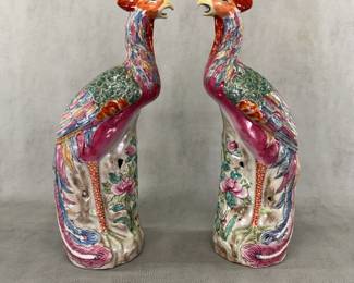 A matched set of vintage Chinese export porcelain Phoenix bird (or Fenghuang) figures, 14-1/2 inches tall, in vibrant famille rose enamels, modeled on a rocky base decorated with flowering peonies. Impressed 4-character mark and "CHINA" on the base.