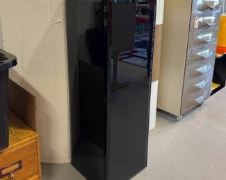 A black beveled glass display pedestal, 12x12x36-1/2"