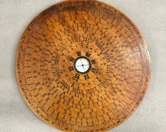 An antique Chinese hardwood Loupan Feng Shui geomantic compass, completely decorated with Chinese ideograms on both the front and back using hand-inscribed calligraphy