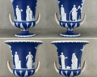 More views of the pair of antique large Wedgwood dark blue dip jasperware double-handled urn shaped vases, 10"H, adorned with finely modeled neoclassical applied sprig decoration. Impressed 'WEDGWOOD' mark on the base.