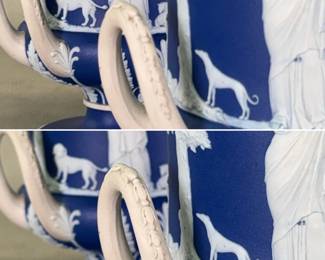 Closeups of the pair of antique large Wedgwood dark blue dip jasperware double-handled urn shaped vases adorned with finely modeled neoclassical applied sprig decoration. Impressed 'WEDGWOOD' mark on the base.