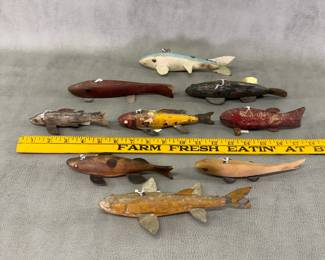 More from the collection of antique hand-carved wooden fishing decoys, many with metal fins and tails and original paint.