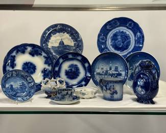 A collection of vintage/antique flow blue porcelain plates, bowls, dishes, vase, cup and saucer 
