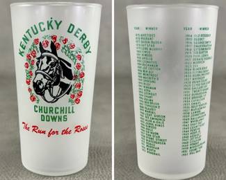 1953 Kentucky Derby glass, frosted white glass with green lettering reading "Kentucky Derby" and "Churchill Downs," a central graphic of a horse framed by a wreath of red roses, and the red script phrase "The Run for the Roses"