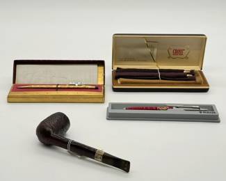 A vintage rustic-finish briar tobacco pipe, vintage pens and mechanical pencils in original presentation boxes from Cross and Parker