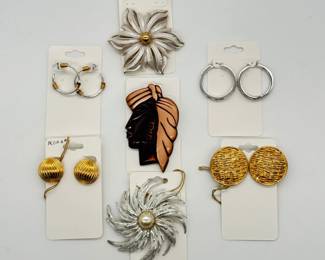 Dramatic vintage costume jewelry brooches and earrings