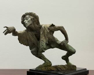 "La Fuite Du Temps" limited edition bronze sculpture by American figurative sculptor Richard MacDonald (b. 1946); on marble base, with artist signature to the edge of sculpture, along with edition number of 12/175. Height is 13.5" including base. Certificate of Authenticity from Merril Chase Galleries. 