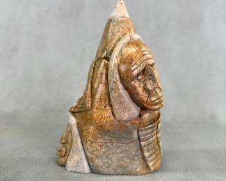 An Iroquois (Six Nations) steatite/soapstone carved sculpture created by Canadian Indigenous artist Dan Thomas, signed on base and dated '83, and approximately 2-1/4"W x 8"H x 5"D.