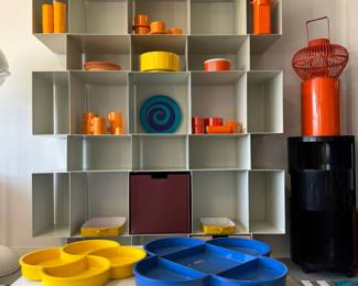 Colorful mid-century plastic plates, mugs, bowls, serving pieces from Scandinavian and Italian designers