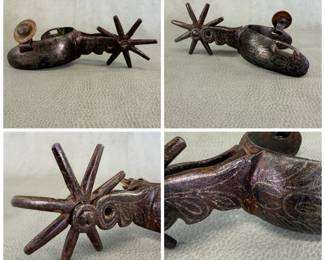 A Mexican Charro or Spanish/Californio-style antique spur, circa 1880, hand-forged iron with engraved hoofprint and leaf motifs across the band showing traces of silver inlay; 8-point rowel.