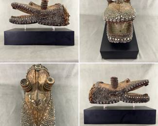 More views of the a vintage African cowrie shell and seed-mounted wood alligator or crocodile head headdress or mask, frequently associated with ceremonial traditions in West or Central African cultures.