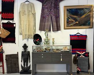 Such variety of art at this sale, including an original, signed painting by Leonardo Nierman; a traditional Plains-style Native American buckskin or hide dress with fringe details, an antique Qing Dynasty silk kesi dragon robe, museum-quality antique Bohemian glass, Navajo textiles, Papua New Guinea Sepik Province wooden sculpture, and more