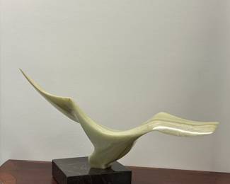 Leonardo Nierman "Seagull" abstract sculpture of a bird in flight, carved pale green onyx on black marble plinth, 29 X 17 X 11" d., signed