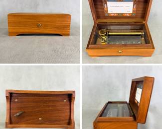 A vintage Reuge Music Sainte-Croix cylinder music box made in Switzerland  featuring a walnut case and a glass dust cover over the brass movement; plays "The Thieving Magpie" (3 parts) by G. Rossini, Model/Movement: CH 3/72 (3-song / 72-note cylinder movement), serial number 37207.