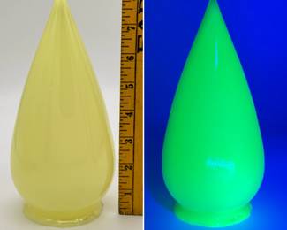Another example from the set of six vintage uranium glass / vaseline glass bullet shades (teardrop or stalactite-style pendant light shade), each with 2-1/2" openings, and approximately 8-1/4" tall