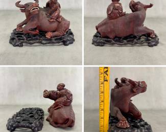 More views of the antique Chinese finely carved wooden sculpture of boy riding a water buffalo; with original custom carved wooden stand.  10" long by 7-1/2" high.