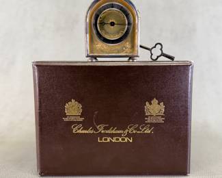 A vintage 1980s Charles Frodsham & Co. London "Elizabeth of Glamis" limited edition sterling silver desk/carriage clock with “Mile-stone” case, #403/800, with original box. 