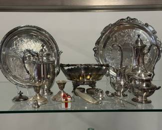 Vintage silver plate items including circular trays or platters; 1847 Rogers Bros. Argosy coffee pot with matching lidded sugar bowl and creamer; serving pieces, sterling candle stick holders, centerpiece bowl, and more