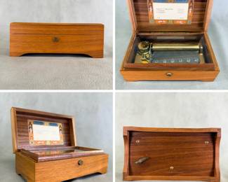 A vintage Reuge Music Sainte-Croix cylinder music box made in Switzerland  featuring a walnut case and a glass dust cover over the brass movement; plays "Sonate No. 2 - Clair de Lune by L. Beethoven, 5ᵉ Symphonie by L. Beethoven, 9ᵉ Symphonie by L. Beethoven; Model/Movement: CH 3/72 (3-song / 72-note cylinder movement), serial number 37216.