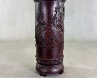 A vintage Chinese carved bamboo scholar's brush pot (bitong), 8 inches tall, featuring a detailed high-relief carving of a phoenix bird. 