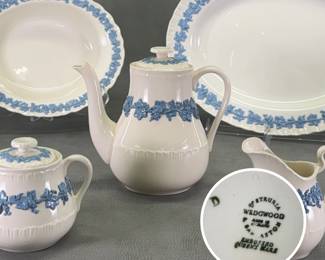 Closeups of vintage Wedgwood Etruria Embossed Queen's Ware vegetable dish, oval serving platter, coffee pot, lidded sugar, and creamer