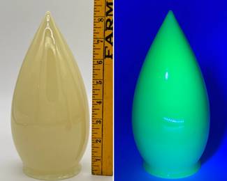 One from a set of six vintage uranium glass / vaseline glass bullet shades (teardrop or stalactite-style pendant light shade), each with 2-1/2" openings, and approximately 8-1/4" tall