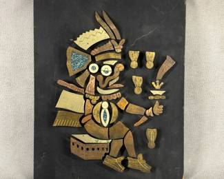 A vintage Mid-Century Mexican folk art wall plaque featuring a stylized Mesoamerican (Aztec or Mayan) figure, crafted in the style of Los Castillo from Taxco, Mexico.  9-1/2"W x 11-3/4"W.