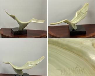 More views of Leonardo Nierman "Seagull" abstract sculpture of a bird in flight, carved pale green onyx on black marble plinth, 29 X 17 X 11" d., signed