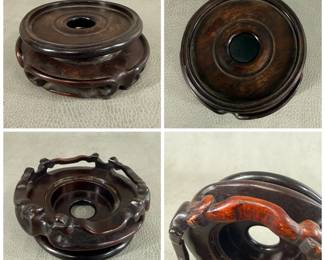 A vintage Chinese turned and carved hardwood circular display stand, with one smooth upper level and the lower level carved with naturalistic root-like open work; commonly used to showcase porcelain vases, bowls, or scholar's rocks.  5"W x 2"H.