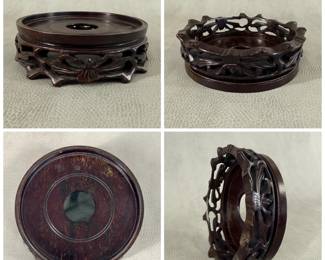 A vintage Chinese carved hardwood display stand featuring an openwork scrolling foliate design, 6-1/4"W x 2"H.