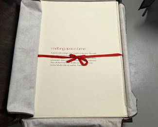 Inside the wooden presentation box for "Imaginations and Objects of the Future." The complete portfolio, comprising 11 intaglios and lithographs printed in colors, six with collage, and including Dalinean Prophecy; 1975, each signed in pencil and inscribed 'LVI/LXXV', the prints on Japon, the cover sheets on wove, with title and justification pages and introductory text in English by the artist and publisher.