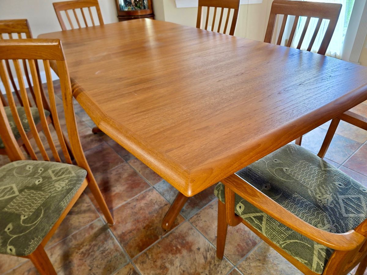 Nordic Furniture located in Markdale, Ontario, Canada. Teak dining set with built in leaf storage