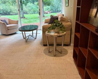 granite coffee table, swivel chair, bookcase