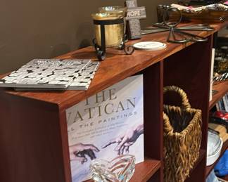 books, household items, candles, decorative pieces