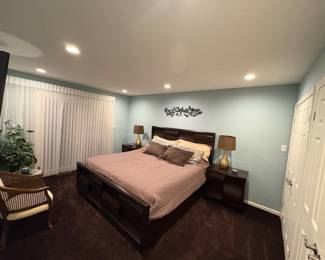 King Size Tempur-pedic mattress with wood bed and end tables