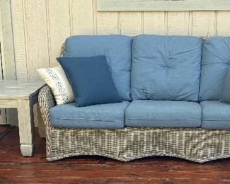 Wicker sofa w pillows