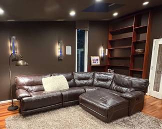 large leather sectional with 3 reclining sections(two additional pieces available are missing in this pic), custom cherry wood corner bookcase