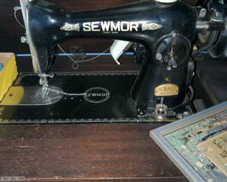 Sewmor sewing machine with cabinet