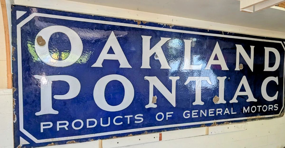 Rare! Oakland Pontiac products of general motors porcelain sign.