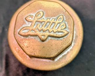 Rear center cap from little motor car company Flint, Michigan
