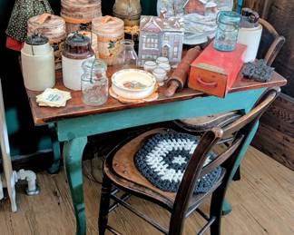Antique shabby table with vintage kitchen items