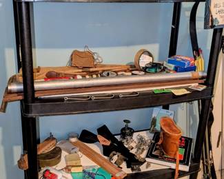 Variety of vintage fishing reels, rods, tackle boxes, bows, BB gun...
