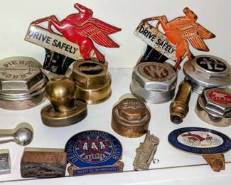 Original Pegasus license plate toppers, many old antique vintage hubcap, radiator caps...