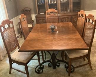 Stanley Furniture dining table with ornamental iron base, 1 leaf and 6 chairs