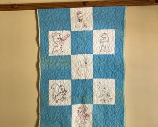 Antique child's quilt w embroidered animals