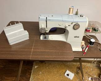 Elna Swiss made sewing machine, folding sewing machine table