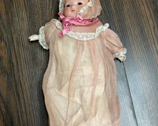 Atique doll with porcelain head and arms