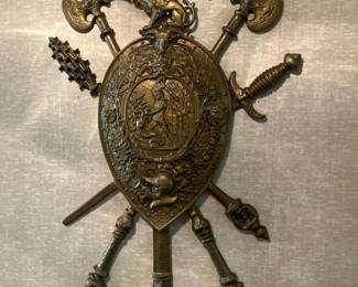 Large bronze crest with the center image of Perseus beheading Medusa