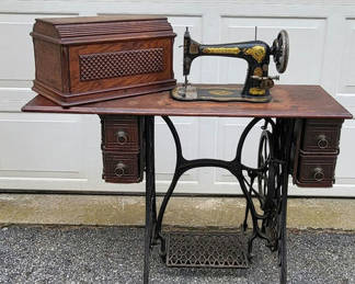 Lot 104: Antique Singer Coffin Top Sewing Machine