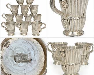Set of twelve vintage Sanborn Mexico silver-plated demitasse or espresso cups featuring an elegant vertically fluted design with scalloped rims, pedestal bases, and ornate scrolling handles accented with applied floral details. Each cup displays the distinctive craftsmanship associated with Sanborn of Mexico and is marked on the underside. The collection retains an attractive aged silver finish with visible patina, tarnish, surface scratches, and signs of use consistent with age. A handsome and substantial matching set for display, entertaining, or a collection of vintage Mexican silver and tableware. Please review photographs carefully for markings, condition, and individual variations; photographs are considered part of the description.